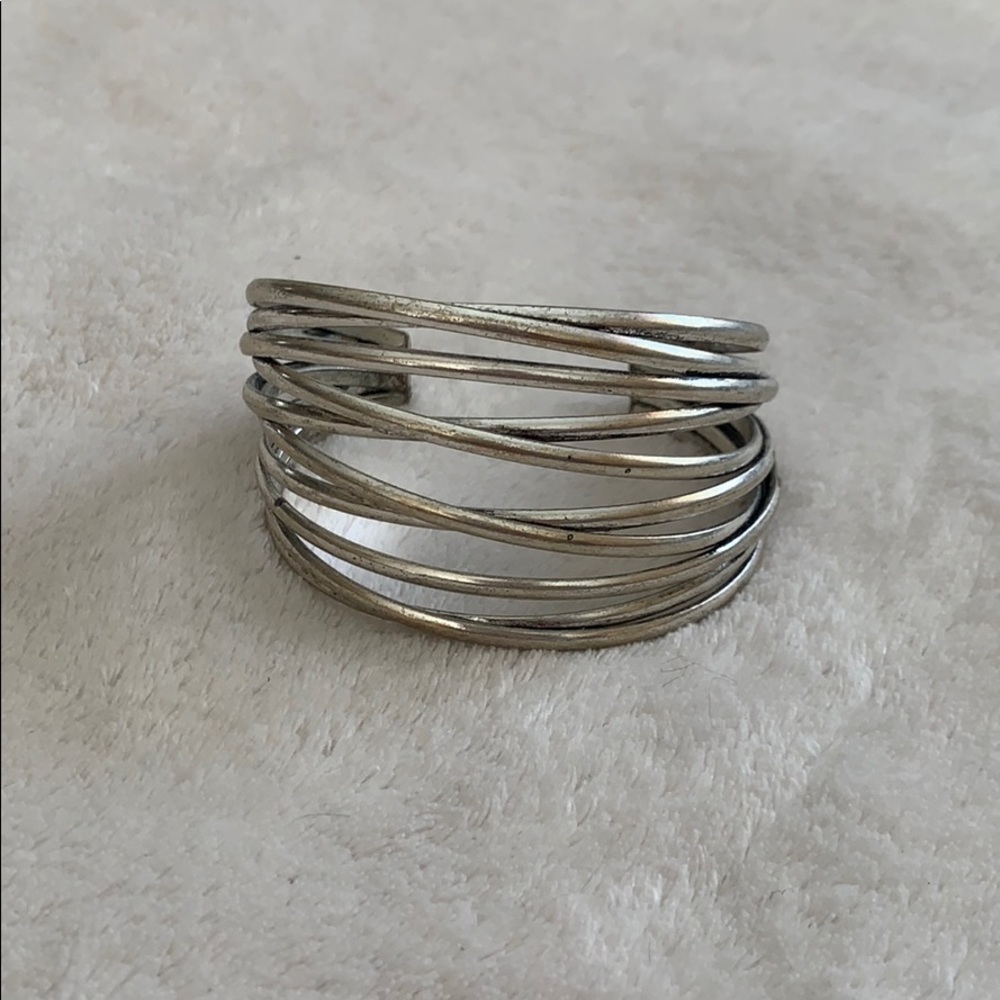 Silver cuff.